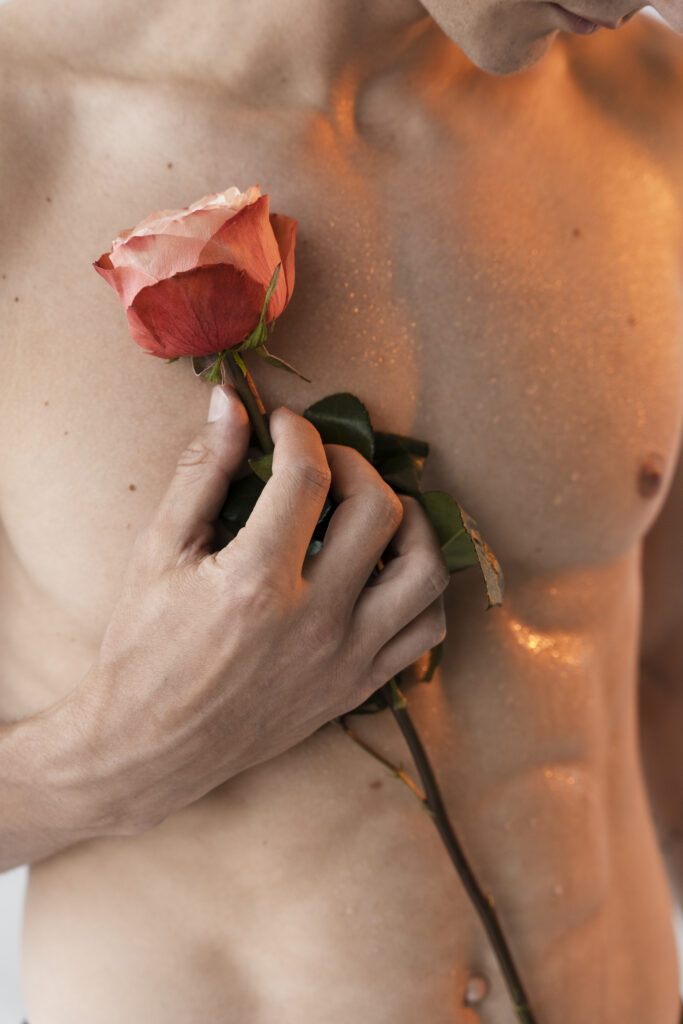 Male Escort Service in Mumbai Nights close up man holding rose